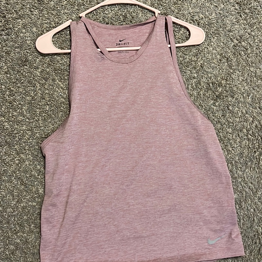 This is a gently used lavender Nike tanktop. It is dry fit material.